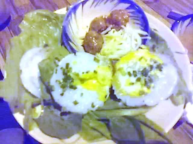 Bánh căn nướng trên khuôn đất